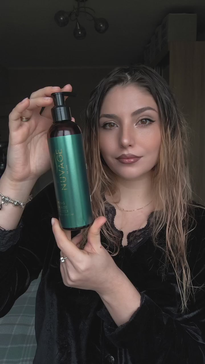Nuvage Sculpting Hair Glaze held by a model demonstrating its benefits for styling and shine.